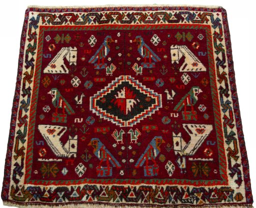 Surface texture of 2000s Shiraz rug with natural Wool and intricate pattern