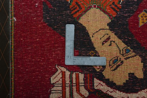 Backside of handmade 2000s Shiraz rug showing knot structure and weave density