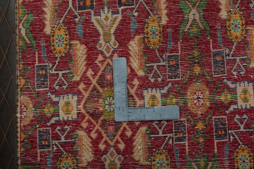 Backside of handmade 2000s Shiraz rug showing knot structure and weave density