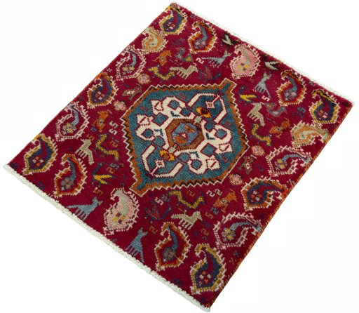 Corner detail of 2000s Shiraz rug showing border pattern and Wool pile