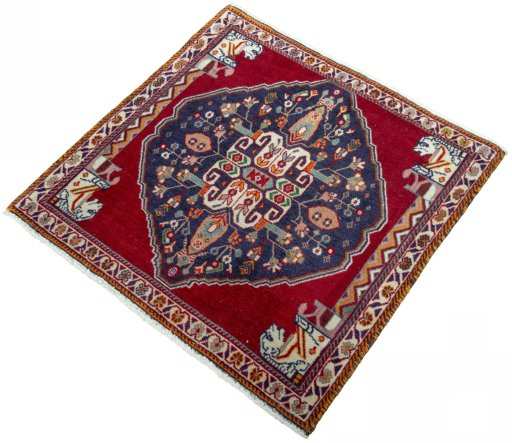 Corner detail of 2000s Shiraz rug showing border pattern and Wool pile