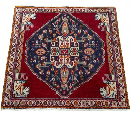 Surface texture of 2000s Shiraz rug with natural Wool and intricate pattern