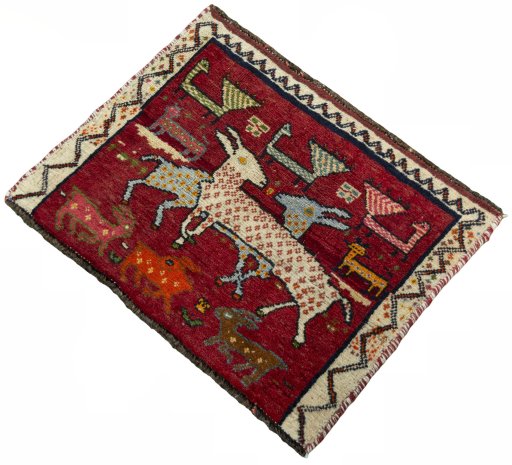 Corner detail of 2000s Shiraz rug showing border pattern and Wool pile