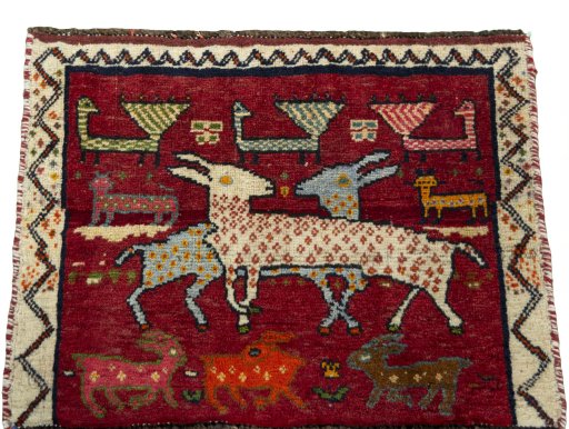 Surface texture of 2000s Shiraz rug with natural Wool and intricate pattern