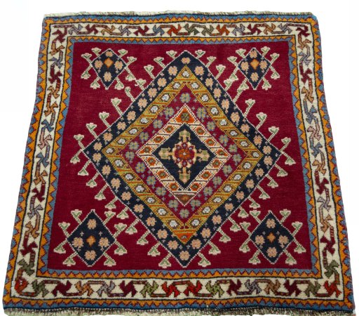 Surface texture of 2000s Shiraz rug with natural Wool and intricate pattern