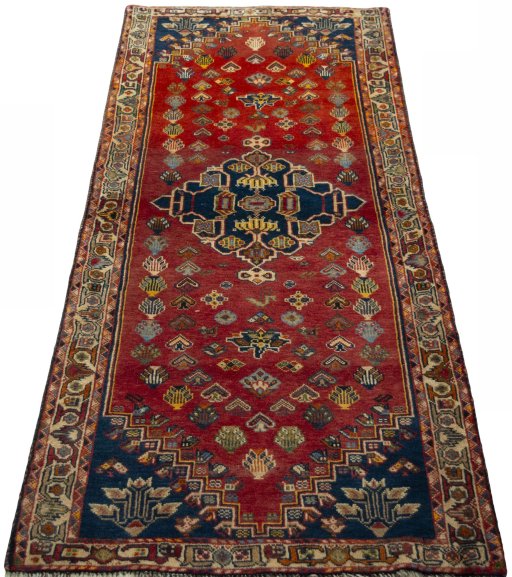 Surface texture of 2000s Shiraz rug with natural Wool and intricate pattern