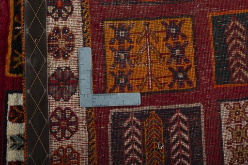 Corner detail of 2000s Shiraz rug showing border pattern and Wool pile