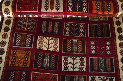 Full view of 2000s Shiraz rug from Iran / Persia, 186 × 103 cm in Red tones