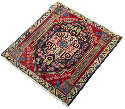 Corner detail of 2000s Shiraz rug showing border pattern and Wool pile