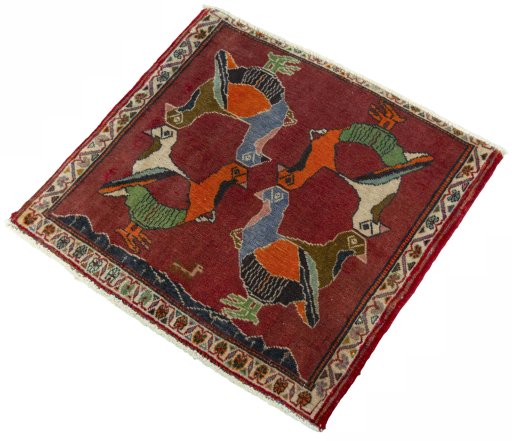 Corner detail of 2000s Shiraz rug showing border pattern and Wool pile