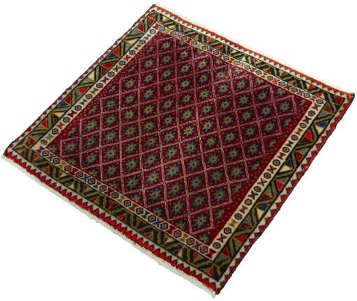 Corner detail of 2000s Shiraz rug showing border pattern and Wool pile