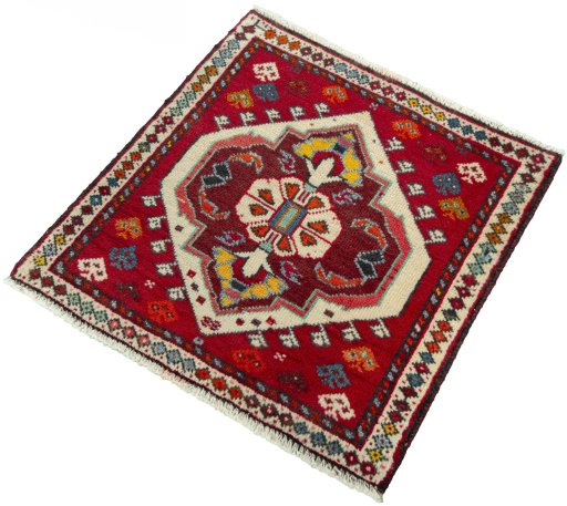 Corner detail of 2000s Shiraz rug showing border pattern and Wool pile