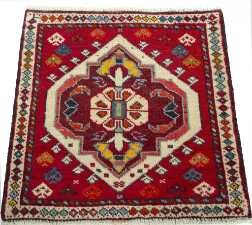 Surface texture of 2000s Shiraz rug with natural Wool and intricate pattern
