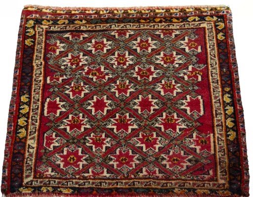 Surface texture of 2000s Shiraz rug with natural Wool and intricate pattern