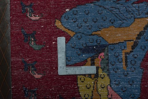 Backside of handmade 2000s Shiraz rug showing knot structure and weave density