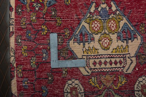 Backside of handmade 2000s Shiraz rug showing knot structure and weave density