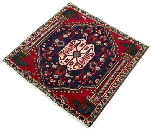 Corner detail of 2000s Shiraz rug showing border pattern and Wool pile