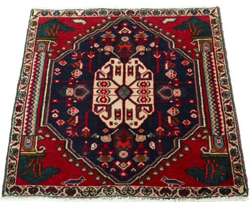Surface texture of 2000s Shiraz rug with natural Wool and intricate pattern