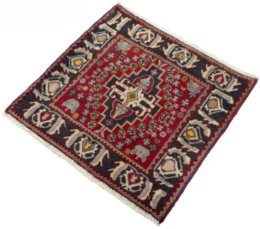 Corner detail of 2000s Shiraz rug showing border pattern and Wool pile