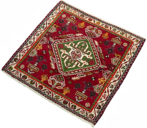 Corner detail of 2000s Shiraz rug showing border pattern and Wool pile