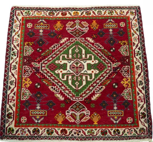 Surface texture of 2000s Shiraz rug with natural Wool and intricate pattern