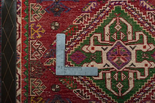 Backside of handmade 2000s Shiraz rug showing knot structure and weave density