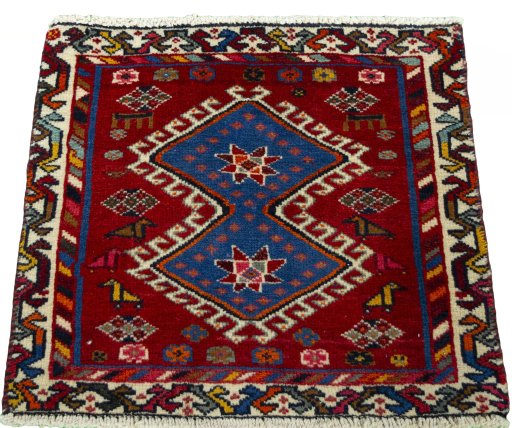 Surface texture of 2000s Shiraz rug with natural Wool and intricate pattern