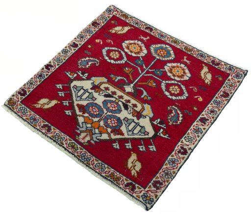 Corner detail of 2000s Shiraz rug showing border pattern and Wool pile
