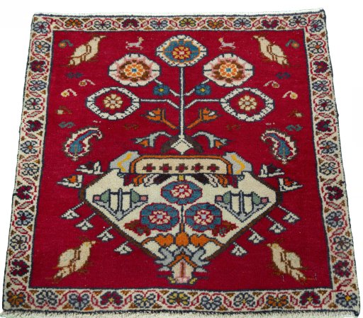 Surface texture of 2000s Shiraz rug with natural Wool and intricate pattern