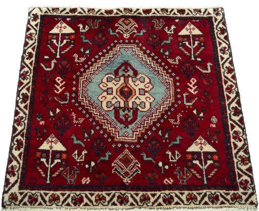 Surface texture of 2000s Shiraz rug with natural Wool and intricate pattern