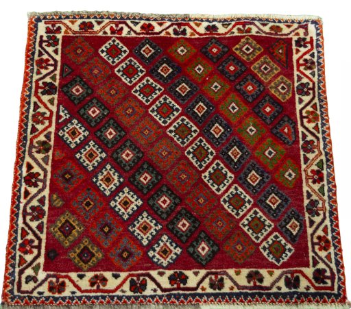 Surface texture of 2000s Shiraz rug with natural Wool and intricate pattern