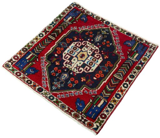 Corner detail of 2000s Shiraz rug showing border pattern and Wool pile