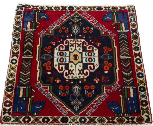 Surface texture of 2000s Shiraz rug with natural Wool and intricate pattern