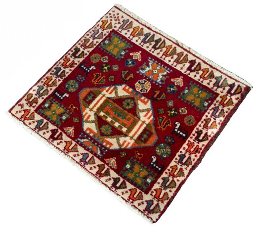 Corner detail of 2000s Shiraz rug showing border pattern and Wool pile