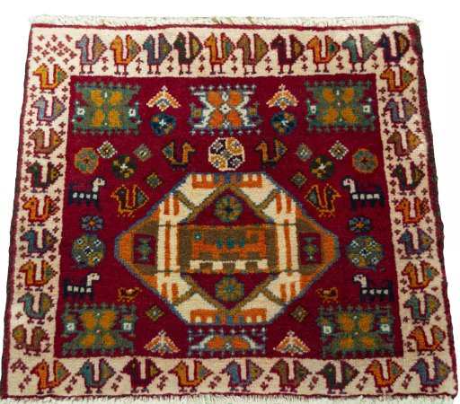 Surface texture of 2000s Shiraz rug with natural Wool and intricate pattern