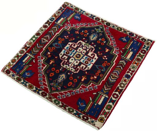 Corner detail of 2000s Shiraz rug showing border pattern and Wool pile