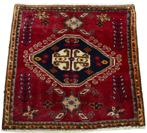 Surface texture of 2000s Shiraz rug with natural Wool and intricate pattern