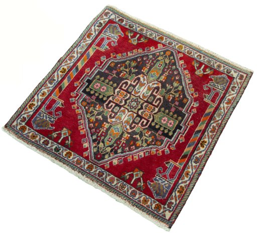 Corner detail of 2000s Shiraz rug showing border pattern and Wool pile