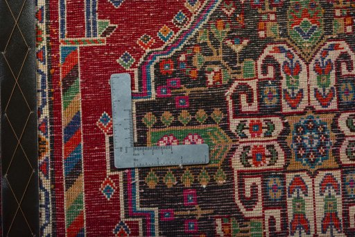 Backside of handmade 2000s Shiraz rug showing knot structure and weave density