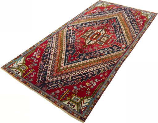 Corner detail of 1970s Shiraz rug showing border pattern and Wool pile