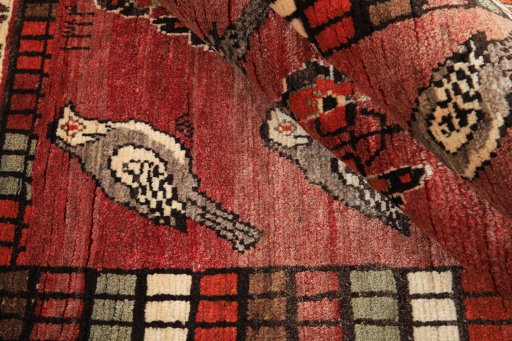 Corner detail of 2000s Shiraz rug showing border pattern and Wool pile