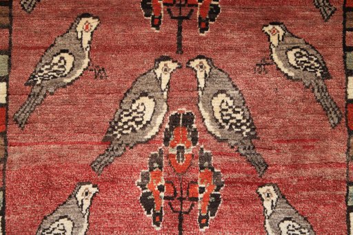 Full view of 2000s Shiraz rug from Iran / Persia, 195 × 108 cm in Red tones