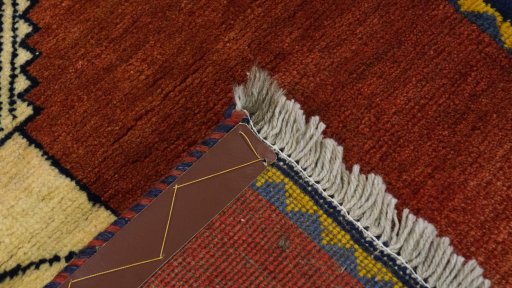 Close-up detail of 1990s Shiraz rug from Iran / Persia showing Wool weave