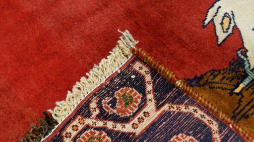 Close-up detail of 1990s Shiraz rug from Iran / Persia showing Wool weave