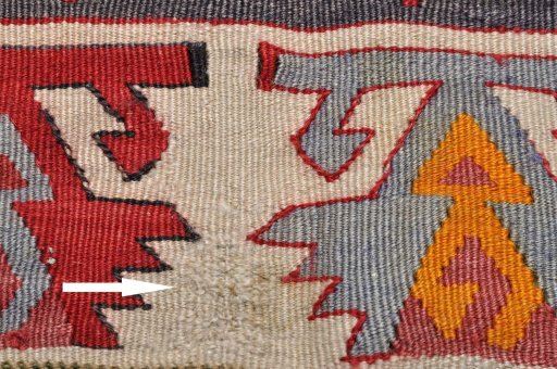 Close-up detail of 1950s Sirjan rug from Iran / Persia showing Wool weave
