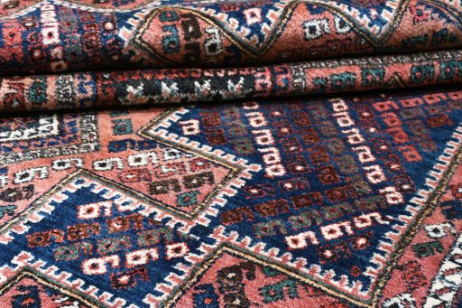 Close-up detail of 1970s Sirjan rug from Iran / Persia showing Wool weave