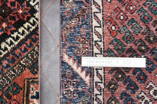 Surface texture of 1970s Sirjan rug with natural Wool and intricate pattern