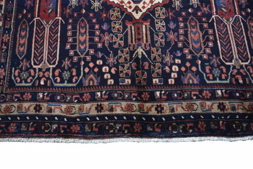 Close-up detail of 2000s Sirjan rug from Iran / Persia showing Wool weave