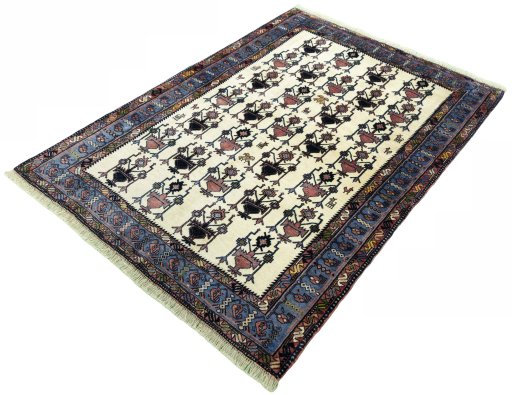 Corner detail of New Sirjan rug showing border pattern and Wool pile