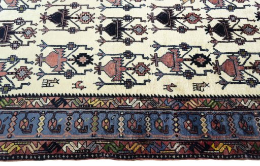 Close-up detail of New Sirjan rug from Iran / Persia showing Wool weave